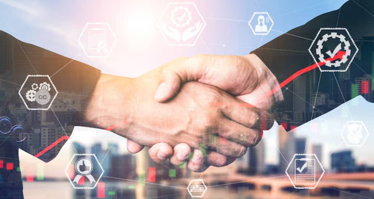 Two businesspeople shake hands with digital icons representing growth and quality control in the background, symbolizing partnership and progress.
