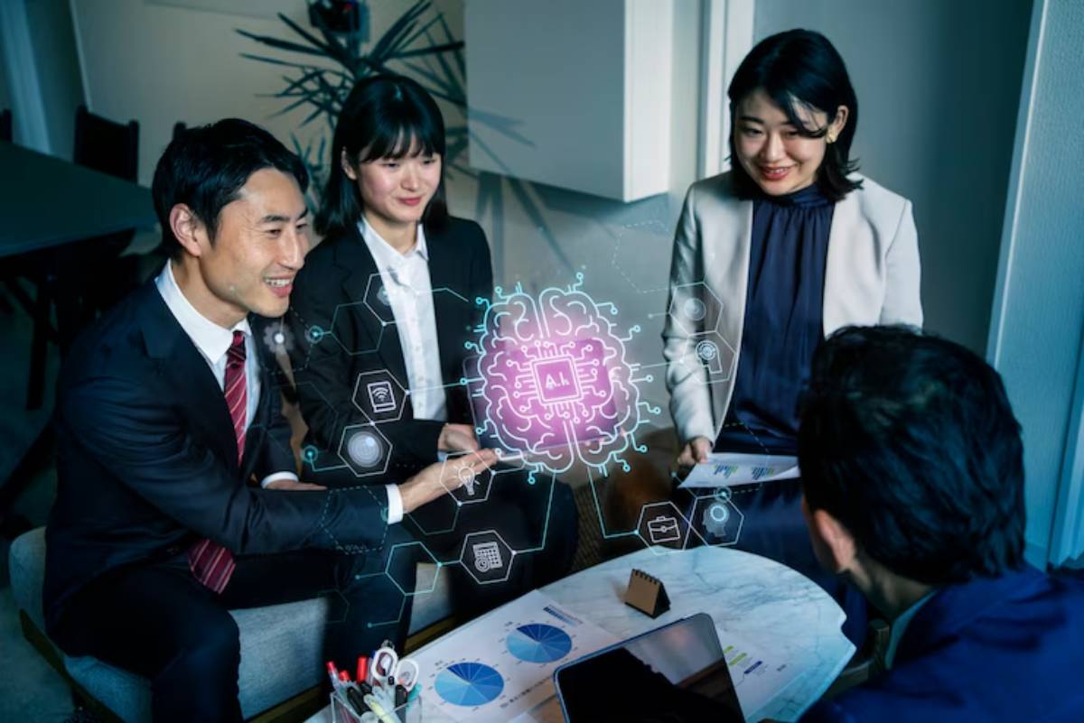 A diverse group of professionals discussing AI strategies with digital graphics illustrating concepts around a table in a modern office setting.